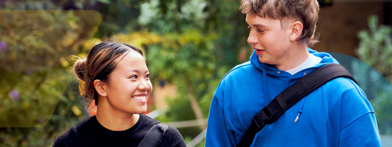 students walking through garden