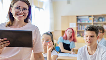 Teacher with students in classroom